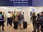 Israeli passengers arrive at Ben Gurion Airport after the Flydubai rescue flight landed in Tel Aviv.