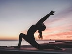 Try these simple yoga poses to relax your body, ease stress and wind down before sleep.(Unsplash)