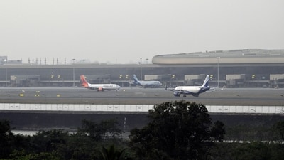 Planes at the Navi Mumbai Airport. Airlines say imposing restrictions on "ancillary revenue", such as seat-selection fee, "undermines commercial flexibility and interferes with market-driven pricing mechanisms", in letter to ministry. (Bloomberg Photo) Planes at the Navi Mumbai Airport. Airlines say imposing restrictions on "ancillary revenue", such as seat-selection fee, "undermines commercial flexibility and interferes with market-driven pricing mechanisms", in letter to ministry. (Bloomberg Photo)