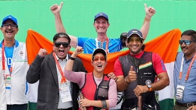 India's Neeru Dhanda and Kynan Chenai celebrate with others after winning gold medal in the trap mixed team shooting event during the 20th Asian Games, in Nagoya, Japan (PTI) India's Neeru Dhanda and Kynan Chenai celebrate with others after winning gold medal in the trap mixed team shooting event during the 20th Asian Games, in Nagoya, Japan (PTI)