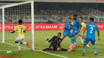 India's Gurpreet Singh Sandhu in action with Brazil's Vinicius Junior (REUTERS)