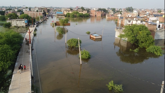 An aerial view of a flooded area of Faizullaganj ward after the Gomti River's water level rose. (HT)