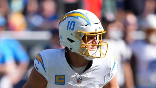 Los Angeles Chargers quarterback Justin Herbert runs up field during the first half of an NFL football game against the Seattle Seahawks, Sunday, Oct. 4.