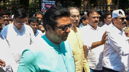 Shiv Sena (UBT) chief Uddhav Thackeray, MNS chief Raj Thackeray, and leaders from Congress and NCP (SP) lead the 'Virat Garjana Morcha' from Metro Cinema to the Brihanmumbai Municipal Corporation headquarters against Chief Election Commissioner (CEC) Gyanesh Kumar over alleged irregularities in the Special Intensive Revision (SIR) of electoral rolls, in Mumbai, Maharashtra, Sunday. (PTI)