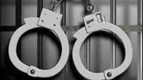 Police recover 9mm Glock, 10 live cartridges and motorcycle from them,they suspect the duo threatened bizmen, social media influencers for extorting money. (HT File)