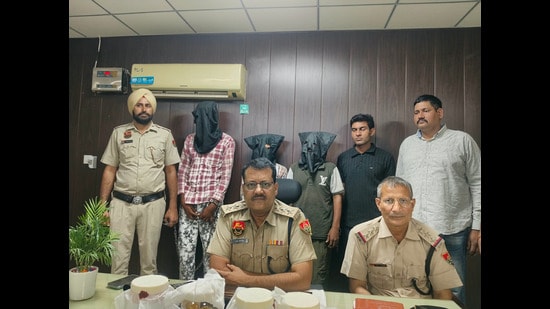 The three accused in police custody on Sunday. (HT Photo)