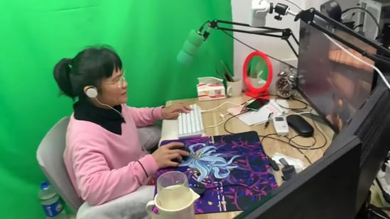 Zhong Juanjuan plays video games during a livestream. (South China Morning Post)