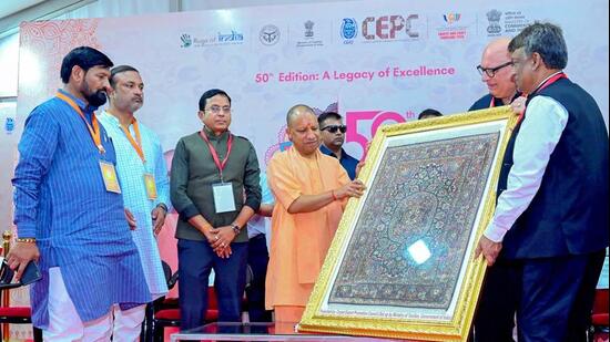 Uttar Pradesh chief minister Yogi Adityanath at the India Carpet Expo in Bhadohi on Sunday. (ANI PHOTO)