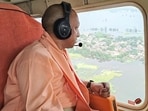 Chief minister Yogi Adityanath conducts an aerial survey of the flood-affected areas. 