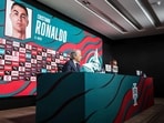 Portugal's coach Jorge Jesus speaks during a press conference to announce the list of players for the next Nations League qualifying matches, with a screen showing Portugal's forward #7 Cristiano Ronaldo on the list of players 