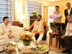 Haryana Chief Minister Nayab Singh Saini holds discussions with officials before travelling to Singapore. Haryana Industries and Commerce Minister Rao Narbir Singh is also seen with him.
