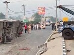 The Amritsar-bound tourist bus that overturned near Majari village on the Phagwara-Chandigarh national highway early on Monday. (HT Photo)