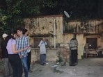 The victim, Madhu Sharma, a native of Alipur in Punjab, had lived alone for about two decades in a dilapidated single-storey house built on a 250-square-yard plot. Police said the house had no functioning electricity or water connection. Parts of the roof had collapsed, and vegetation had spread across the property. (HT Photo)