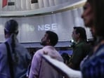 The National Stock Exchange of India Ltd. (NSE) logo on display during the company's listing ceremony at the Bombay Stock Exchange (BSE) in Mumbai on Sept 24