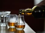 An official said the excise department is studying how the revised tariff structure will affect liquor prices in the Capital. 