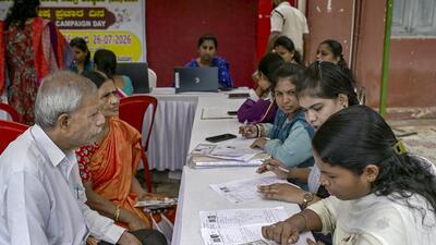 Booth Level Officers (BLOs) verify voter details during the special intensive revision (SIR) of electoral rolls at a special campaign weekend organised by Shivamogga Municipal Corporation, in Shivamogga. (PTI FILE) Booth Level Officers (BLOs) verify voter details during the special intensive revision (SIR) of electoral rolls at a special campaign weekend organised by Shivamogga Municipal Corporation, in Shivamogga. (PTI FILE)
