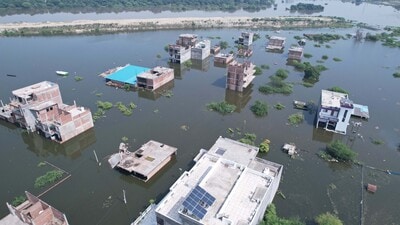 Flooded residential colonies in Sector 7 of Gomti Nagar Extension, near the Ekana International Cricket Stadium, following a rise in the water level of the Gomti in Lucknow on Monday. (Deepak Gupta/HT Photo)