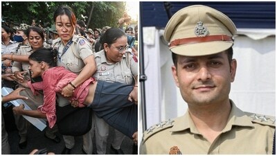 ACP Vivek Bhagat (R). accused of sexual harassment by a woman journalist during the Jantar Mantar protest, was promoted to Additional DCP on Monday. (HT) ACP Vivek Bhagat (R). accused of sexual harassment by a woman journalist during the Jantar Mantar protest, was promoted to Additional DCP on Monday. (HT)