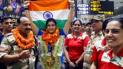 Boxer Parveen Hooda at the IGI airport in New Delhi. (PTI) Boxer Parveen Hooda at the IGI airport in New Delhi. (PTI)