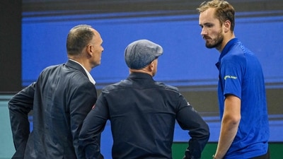 Russia's Daniil Medvedev (R) speaks with the match umpire (L) and an ATP official after he was disqualified for hitting a ball into the stands, injuring a spectator, (AFP) Russia's Daniil Medvedev (R) speaks with the match umpire (L) and an ATP official after he was disqualified for hitting a ball into the stands, injuring a spectator, (AFP)