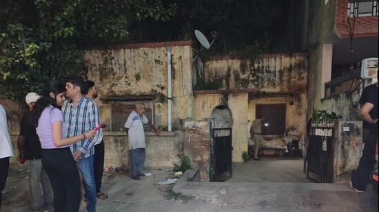 The victim, Madhu Sharma, a native of Alipur in Punjab, had lived alone for about two decades in a dilapidated single-storey house built on a 250-square-yard plot. Police said the house had no functioning electricity or water connection. Parts of the roof had collapsed, and vegetation had spread across the property. (HT Photo)