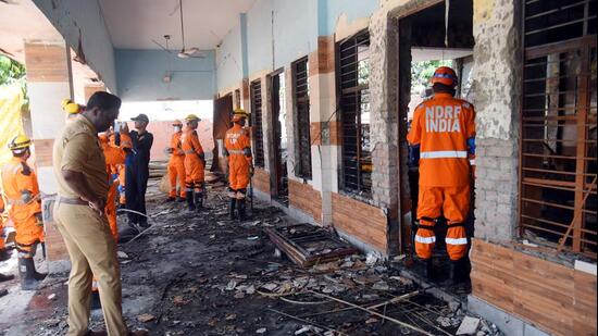 UP police and NDRF teams conduct a search operation at the spot in Ghaziabad on Monday. (Sakib Ali/HT PHOTO)