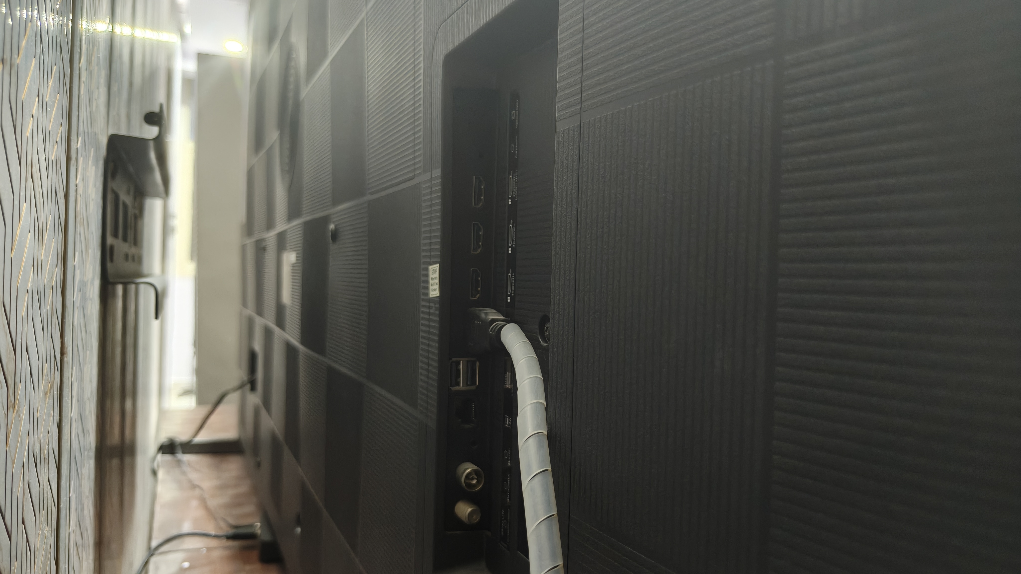 Connectivity is neatly placed on the left, while the rear panel keeps a clean, patterned finish. (Shubh Bhushan - Hindustan Times) Connectivity is neatly placed on the left, while the rear panel keeps a clean, patterned finish. (Shubh Bhushan - Hindustan Times)