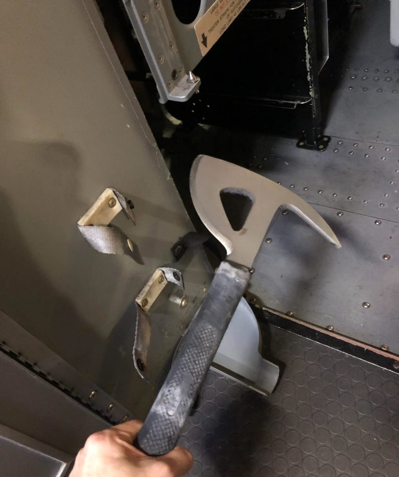 An emergency cockpit ax in a Boeing aircraft. An emergency cockpit ax in a Boeing aircraft.