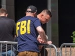 An FBI investigators outside of 26 Federal Plaza in Lower Manhattan after an incendiary device went off outside the building early on July 20. (Representational image)
