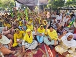 Members of the Bharatiya Kisan Union during a protest on Monday. (HT Photo)