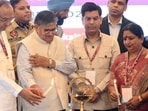 Punjab governor Gulab Chand Kataria with Chandigarh mayor Saurabh Joshi and others during the mayors’ conference in Chandigarh. (Keshav Singh/HT)