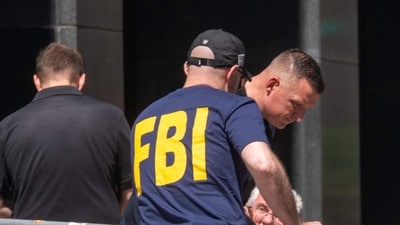 An FBI investigators outside of 26 Federal Plaza in Lower Manhattan after an incendiary device went off outside the building early on July 20. (Representational image) (Getty Images via AFP) An FBI investigators outside of 26 Federal Plaza in Lower Manhattan after an incendiary device went off outside the building early on July 20. (Representational image) (Getty Images via AFP)
