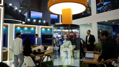 An AI avatar demonstration at the Amazon Web Services (AWS) exhibitor stall at the India Mobile Congress 2025 at Yashobhoomi, a convention and expo center in New Delhi, India, October 8, 2025. (REUTERS File)
