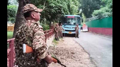 Security personnel stand guard during a raid conducted by Central Bureau of Investigation (CBI) at Punjab Chief Minister Bhagwant Mann’s camp office, in Chandigarh, Tuesday. (PTI) Security personnel stand guard during a raid conducted by Central Bureau of Investigation (CBI) at Punjab Chief Minister Bhagwant Mann’s camp office, in Chandigarh, Tuesday. (PTI)