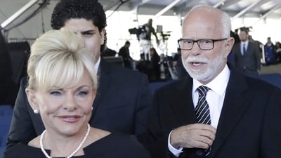 Televangelist Jim Bakker, right, walks with his wife Lori Beth Graham. (AP Photo) Televangelist Jim Bakker, right, walks with his wife Lori Beth Graham. (AP Photo)