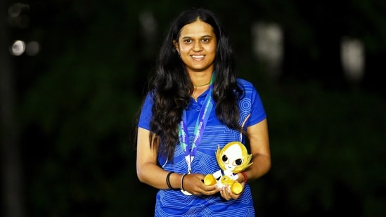 Asian Games - Aichi-Nagoya 2026 - Golf - Kasugai Country Club, Kasugai, Japan - October 3, 2026 Gold medallist India's Pranavi Urs celebrates during the women's individual stroke play medal ceremony REUTERS/Andy Chua