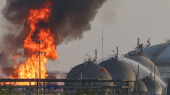 Flames burn at a facility belonging to Saudi oil giant Aramco south of Riyadh.