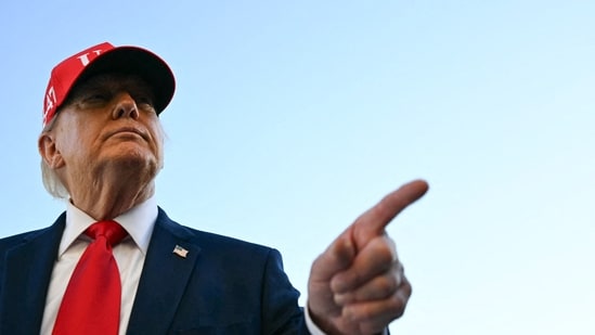 US President Donald Trump speaks to the press upon his return to the White House in Washington, DC. (AFP)