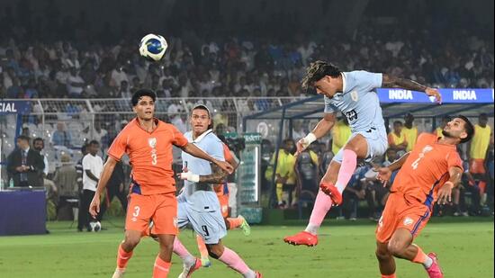 Uruguay and Indian players during FIFA international friendly at Vivekananda Yuva Bharati Stadium in Kolkata, on Tuesday. (Samir Jana/Hindustan Times)