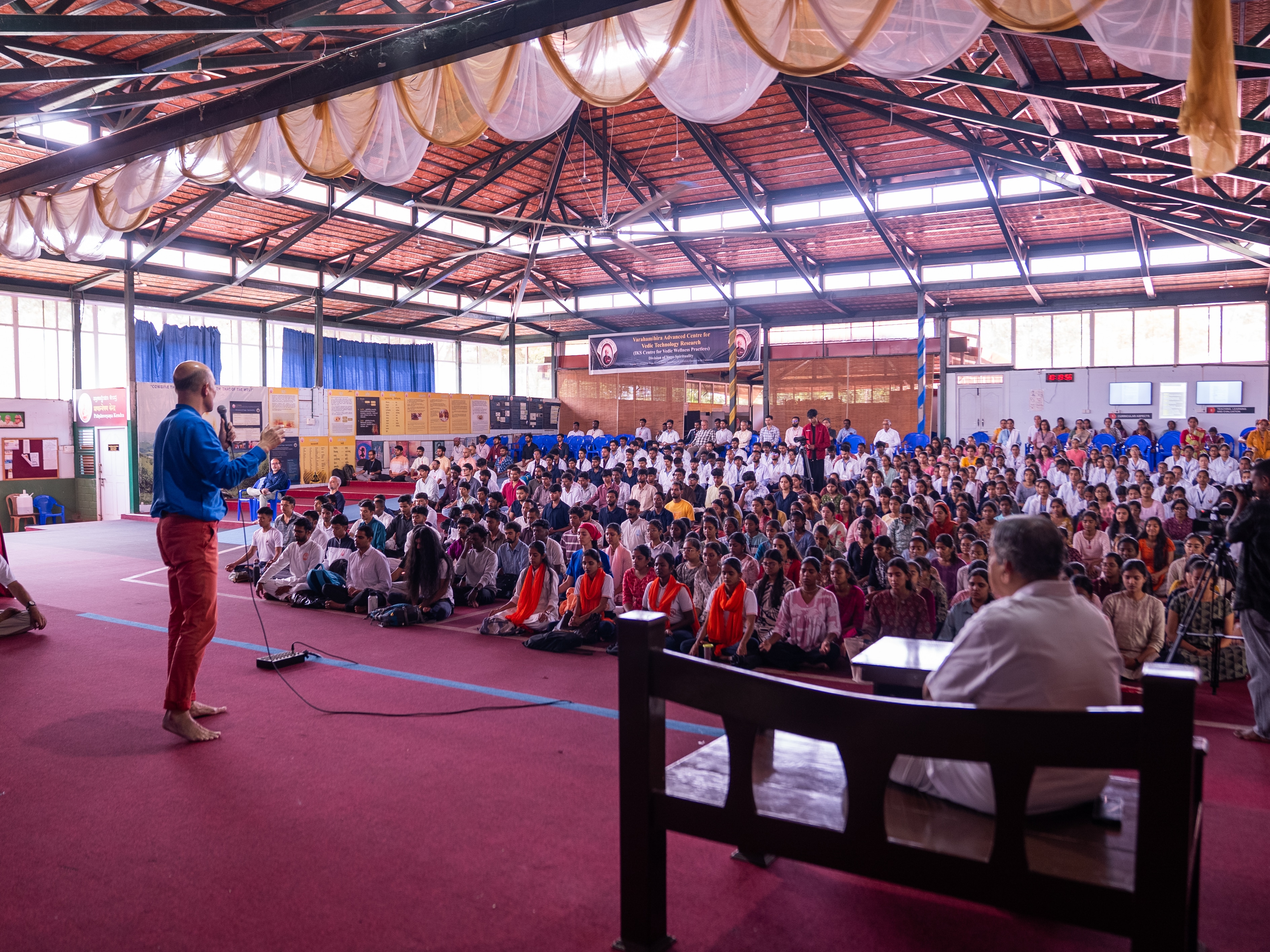 Erkin Bek addressing a session during his India trip.
