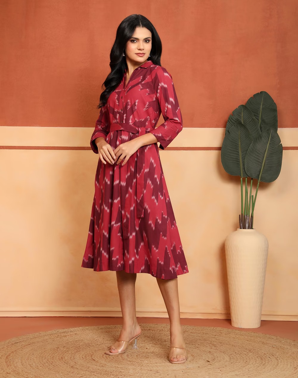 Woven in an Ikat pattern, this cotton midi dress features a panelled silhouette with a regular collar and curved hem. (FabIndia) Woven in an Ikat pattern, this cotton midi dress features a panelled silhouette with a regular collar and curved hem. (FabIndia)