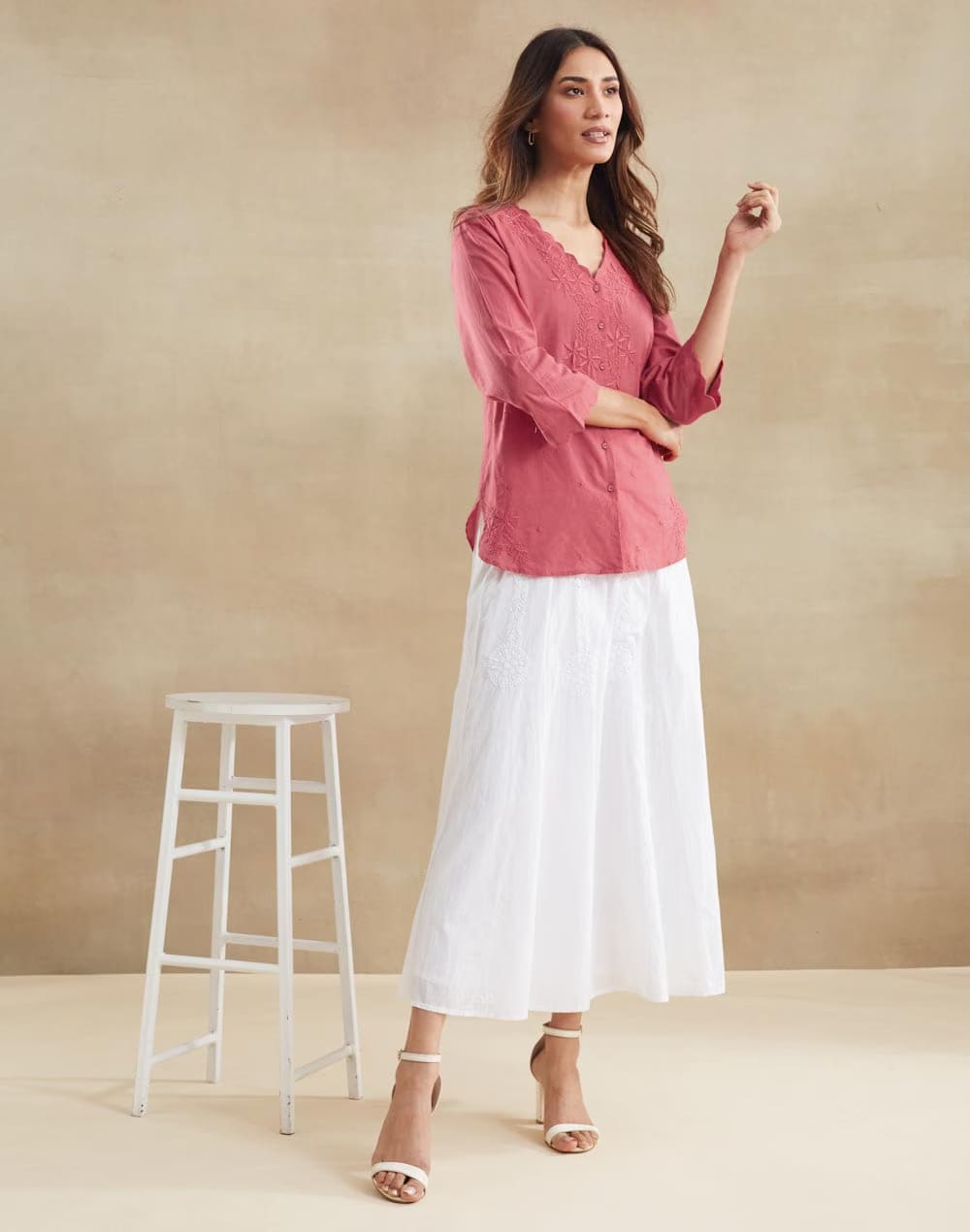 Made from textured slub cotton, this top has a subtle dimension, while the bell sleeves and V-neck placket add a contemporary touch. (FabIndia) Made from textured slub cotton, this top has a subtle dimension, while the bell sleeves and V-neck placket add a contemporary touch. (FabIndia)