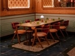 Cosy corner with sage-green panelling; a table with signature cocktails and starters. (Pics: Goonj and Sanya Panwar)