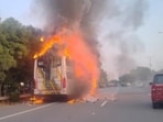 A preliminary investigation suggested that a short circuit in the engine may have triggered the fire. The driver and conductor were detained for investigation, police and fire officials said. (HT Photo)