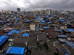 The 2026 policy provides eligible slum dwellers with 25-square-metre rehabilitation flats equipped with civic amenities.