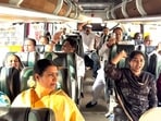 INDIA bloc MPs inside a bus as they move towards Jantar Mantar after a meeting at Sagar Ratna, Janpath, in New Delhi on Wednesday. (@INCIndia X/ANI Video Grab)
