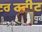 Chief minister Bhagwant Mann addressing the media after laying the foundation stone for a water treatment plant in Dhuri on Wednesday. (HT Photo)