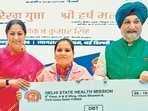 Delhi CM Rekha Gupta and lieutenant governor Taranjit Singh Sandhu at the ASHA Samman Samaroh event on Tuesday. (HT Photo)