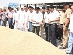 Deputy commissioner Anand Kumar Sharma and ADC Rahul Raiya inspecting the paddy procurement operations at a Karnal mandi on Tuesday. (HT Photo)