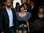 Thai singer and actor Lalisa Manobal was also seen at the Louis Vuitton Women's Spring/Summer 2027 collection fashion show. She wore a statement blouse with voluminous ruffles on the neckline and hem, and a corseted bodice. A black leather mini skirt and gold jewellery rounded off her look.&nbsp;